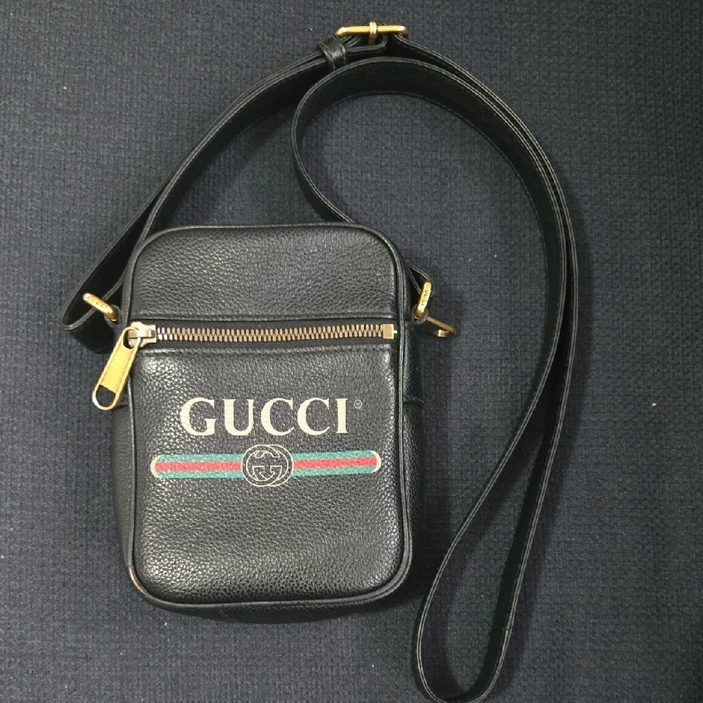 Gucci Black and Gold Messenger Bag with Signature Details